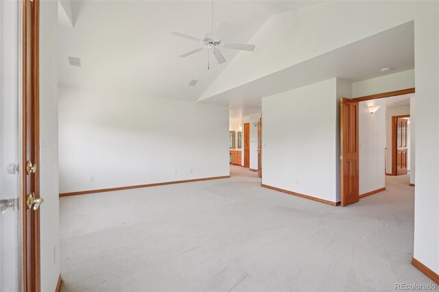 2247 Eagles Nest Dr, Lafayette, CO 80026 - empty room featuring light carpet, a ceiling fan, and high vaulted ceiling