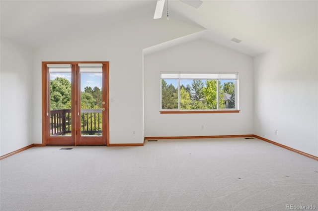 2247 Eagles Nest Dr, Lafayette, CO 80026 - empty room featuring lofted ceiling, carpet, plenty of natural light, and a ceiling fan