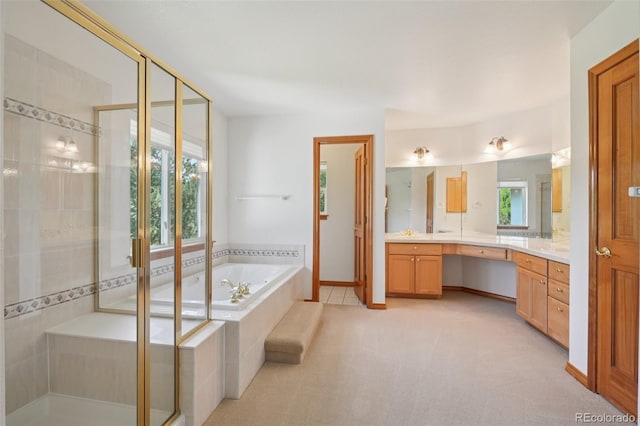 2247 Eagles Nest Dr, Lafayette, CO 80026 - full bath featuring vanity, a shower stall, and a garden tub