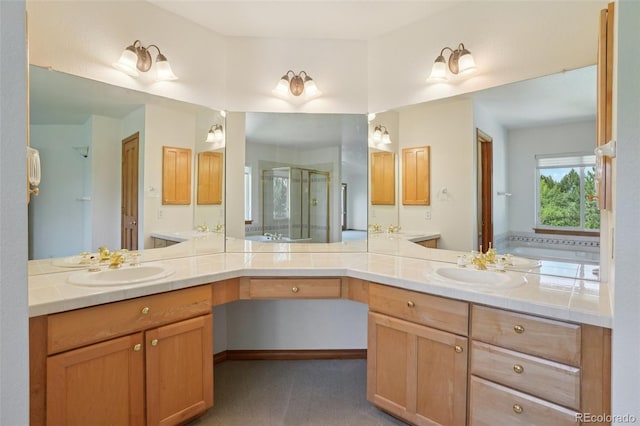 2247 Eagles Nest Dr, Lafayette, CO 80026 - full bathroom featuring a stall shower, double vanity, and a garden tub