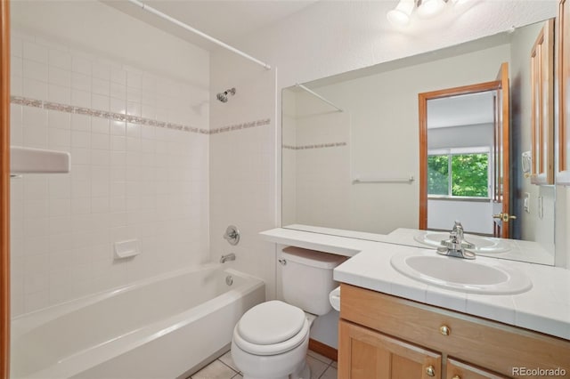 2247 Eagles Nest Dr, Lafayette, CO 80026 - bathroom with vanity, washtub / shower combination, and tile patterned flooring