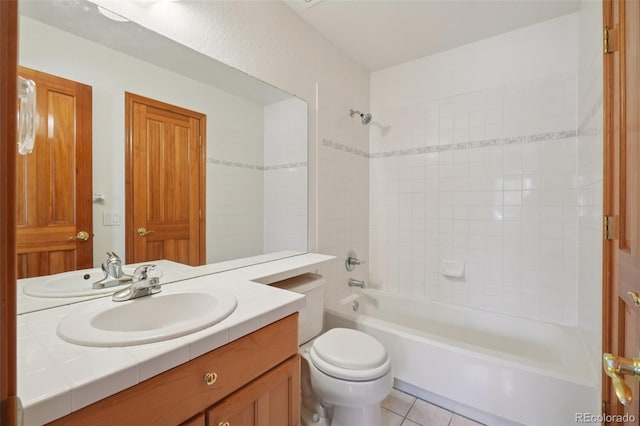 2247 Eagles Nest Dr, Lafayette, CO 80026 - full bath featuring vanity, tub / shower combination, and tile patterned flooring