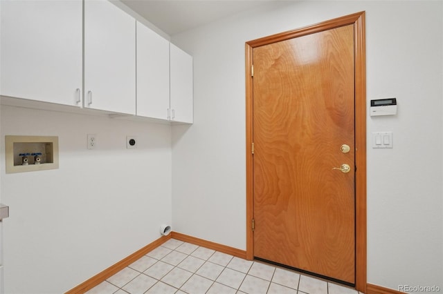 2247 Eagles Nest Dr, Lafayette, CO 80026 - washroom with washer hookup, cabinet space, electric dryer hookup, and light tile patterned floors