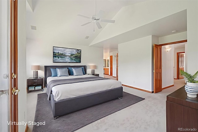 2247 Eagles Nest Dr, Lafayette, CO 80026 - carpeted bedroom with high vaulted ceiling and ceiling fan