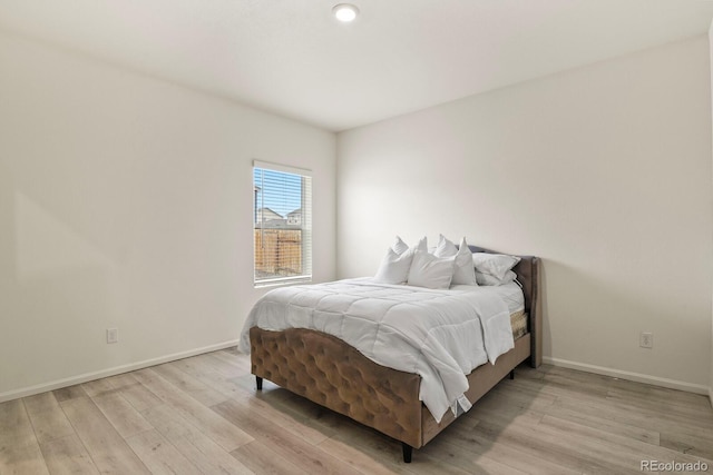 bedroom with light hardwood / wood-style floors