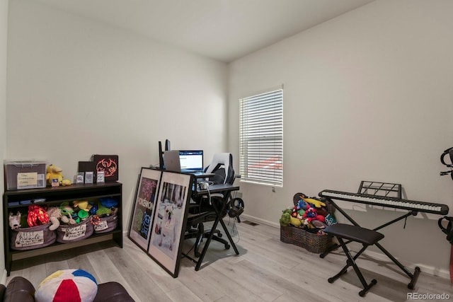 home office featuring light hardwood / wood-style flooring