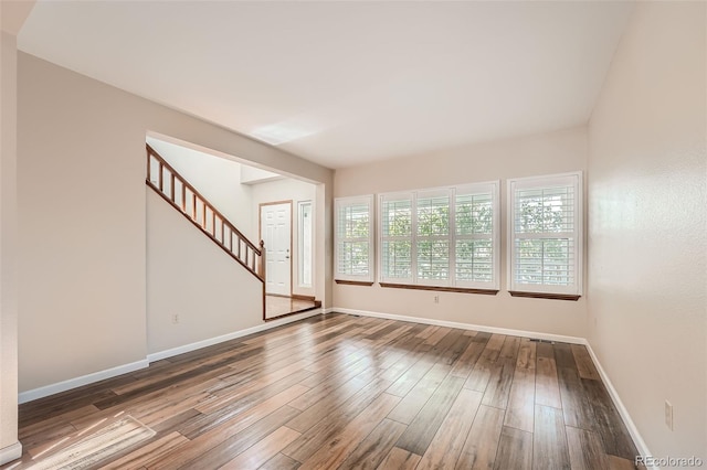 spare room featuring hardwood / wood-style flooring