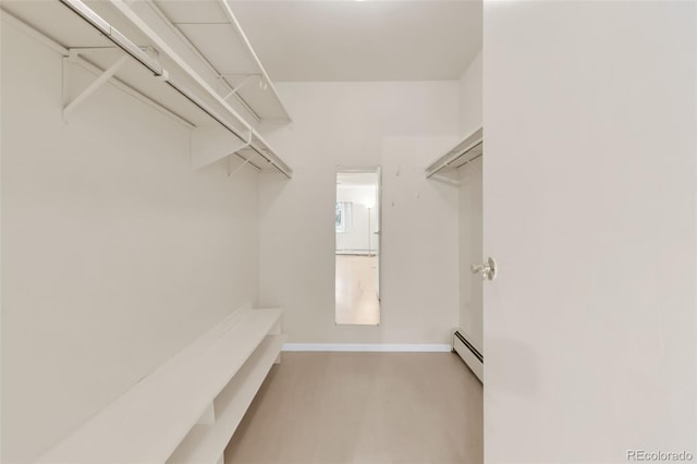 3022 S Wheeling Way Unit 107, Aurora, CO 80014 - spacious closet with a baseboard radiator