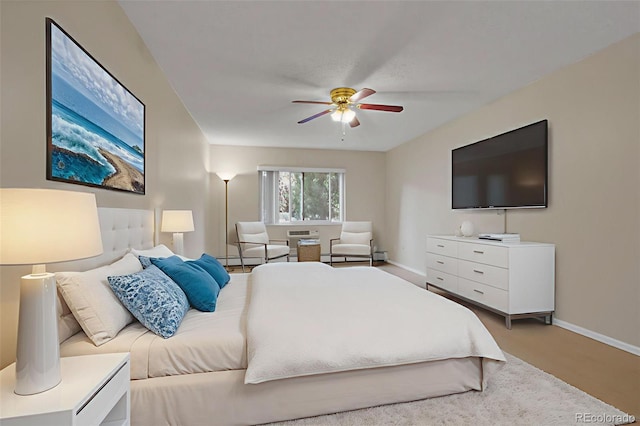3022 S Wheeling Way Unit 107, Aurora, CO 80014 - carpeted bedroom with baseboards and a ceiling fan