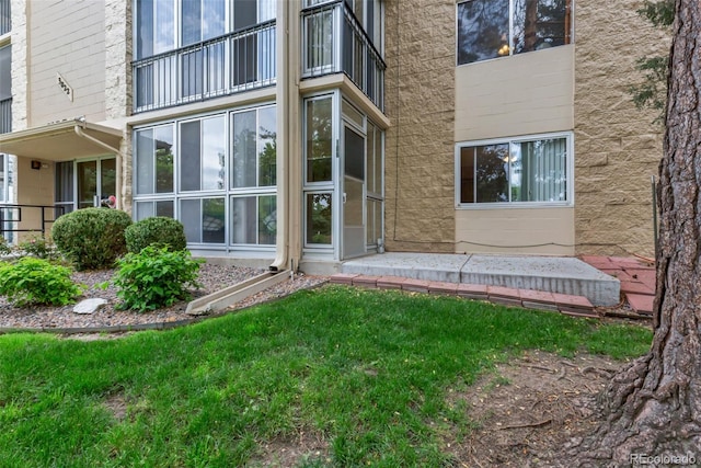 3022 S Wheeling Way Unit 107, Aurora, CO 80014 - doorway to property with a balcony
