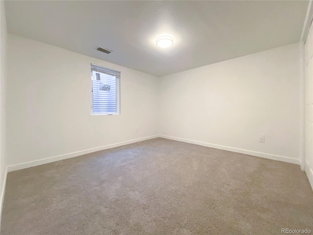 unfurnished room featuring carpet floors