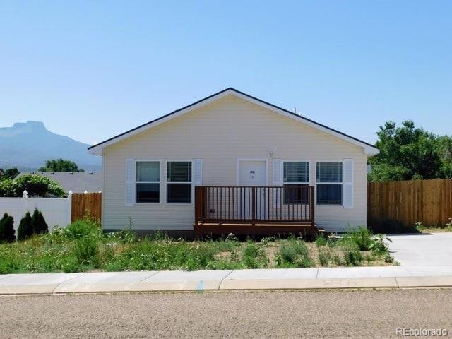 view of front of house with a deck with mountain view