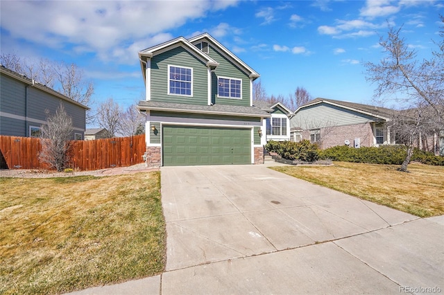 view of front of home with fence, concrete driveway, a front yard, a garage, and stone siding