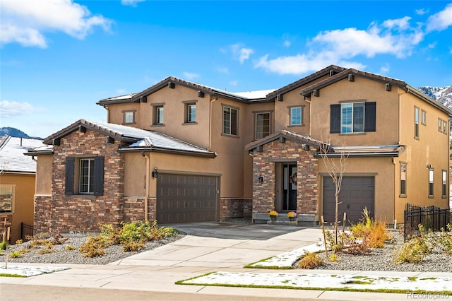 view of front of property featuring a garage