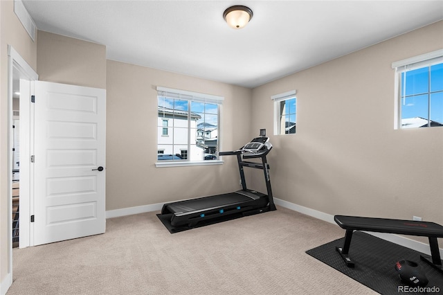 workout room with light carpet