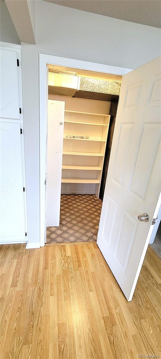 315 W 5th St, Julesburg, CO 80737 - corridor with light wood-style flooring
