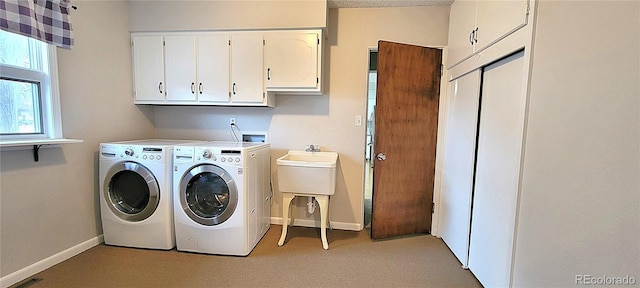 315 W 5th St, Julesburg, CO 80737 - laundry area with separate washer and dryer, baseboards, and cabinet space