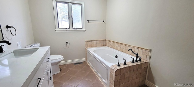 315 W 5th St, Julesburg, CO 80737 - bathroom with a bath, vanity, tile patterned flooring, visible vents, and toilet