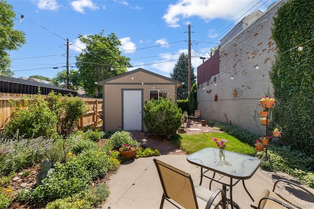 view of patio with a shed