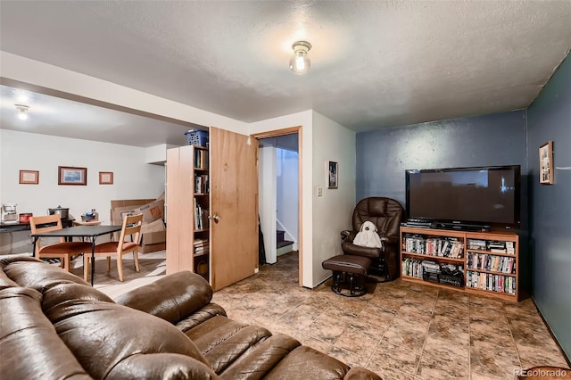 living room with a textured ceiling