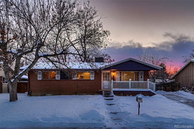 ranch-style home with covered porch