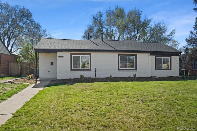 3025 Ivanhoe St, Denver, CO 80207 - single story home featuring brick siding and roof with shingles