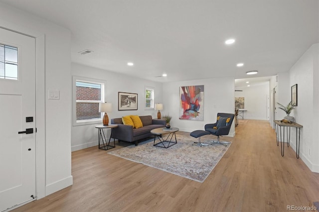 3025 Ivanhoe St, Denver, CO 80207 - living room featuring light wood finished floors and recessed lighting