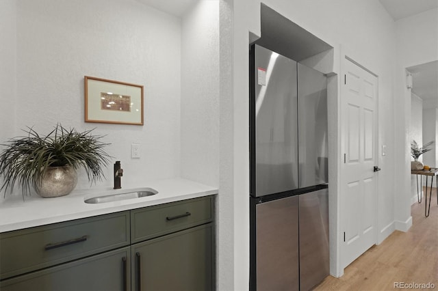 3025 Ivanhoe St, Denver, CO 80207 - bar area with freestanding refrigerator and light wood finished floors