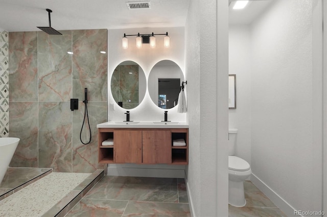 3025 Ivanhoe St, Denver, CO 80207 - full bath featuring a marble finish shower, double vanity, a soaking tub, and marble finish floors