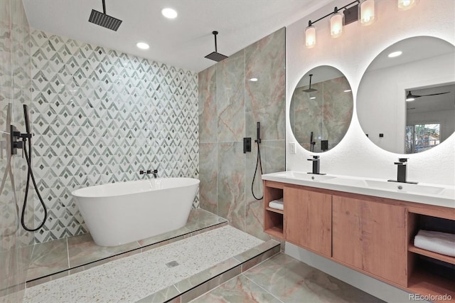3025 Ivanhoe St, Denver, CO 80207 - full bath with a walk in shower, tile walls, marble finish floors, double vanity, and a freestanding bath
