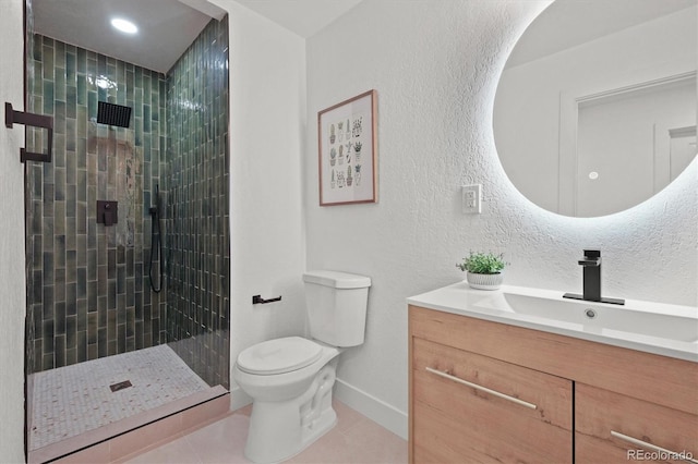 3025 Ivanhoe St, Denver, CO 80207 - full bath with vanity, tile patterned floors, tiled shower, and a textured wall