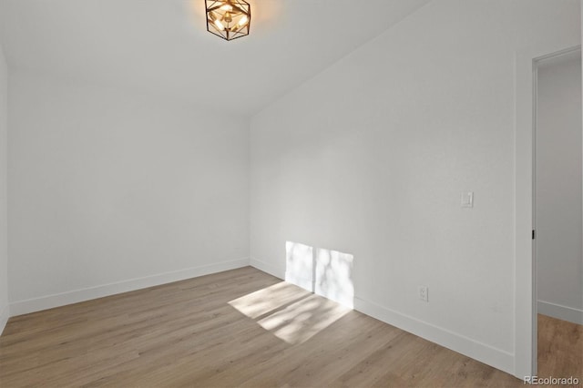 3025 Ivanhoe St, Denver, CO 80207 - unfurnished dining area with light wood-style floors and lofted ceiling
