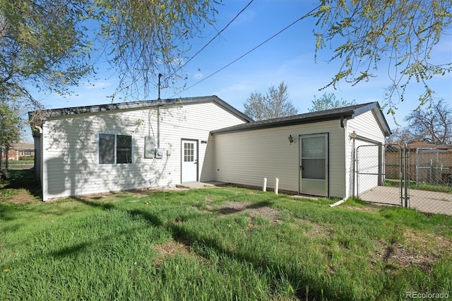 3025 Ivanhoe St, Denver, CO 80207 - back of property featuring a garage and a gate