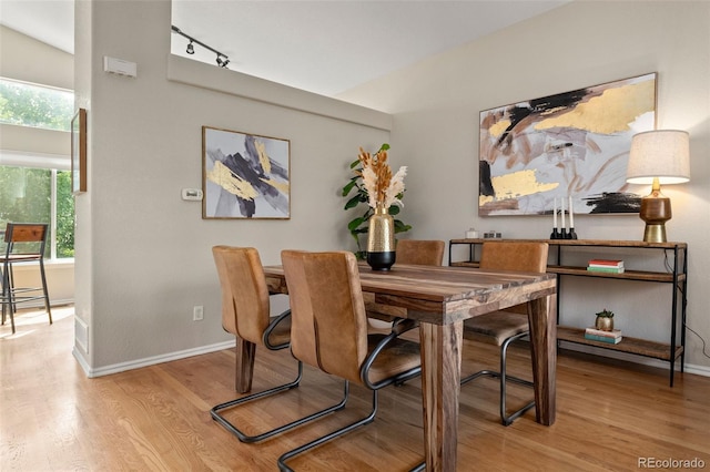 9698 Queenscliffe Dr, Highlands Ranch, CO 80130 - dining area featuring wood finished floors and baseboards