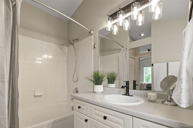 9698 Queenscliffe Dr, Highlands Ranch, CO 80130 - bathroom featuring shower / tub combo with curtain and vanity