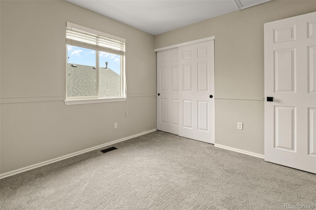 9698 Queenscliffe Dr, Highlands Ranch, CO 80130 - unfurnished bedroom with carpet floors, baseboards, and a closet