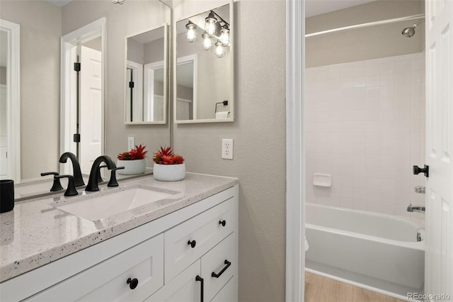 9698 Queenscliffe Dr, Highlands Ranch, CO 80130 - bathroom with vanity and shower / bath combination