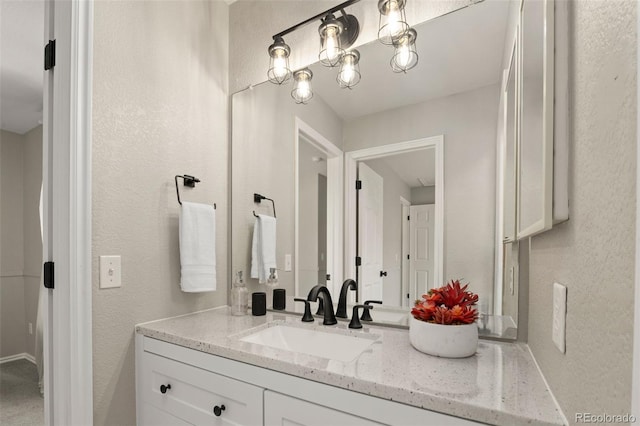 9698 Queenscliffe Dr, Highlands Ranch, CO 80130 - bathroom featuring vanity