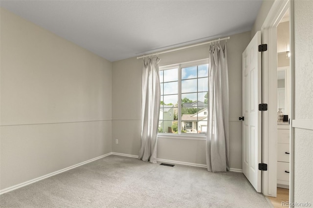 9698 Queenscliffe Dr, Highlands Ranch, CO 80130 - spare room with baseboards and light carpet