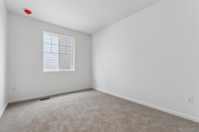 19110 E 96th Pl, Commerce City, CO 80022 - carpeted spare room featuring baseboards