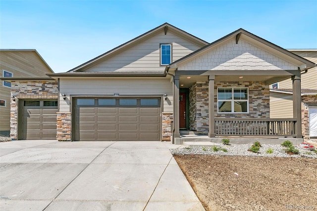 craftsman-style home with a garage and a porch