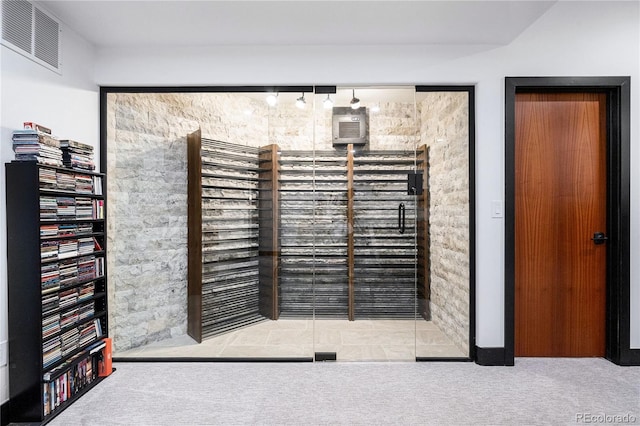 wine room with light carpet