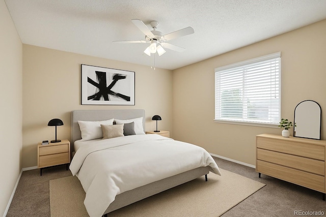 11565 Decatur St Unit 7D, Denver, CO 80234 - bedroom featuring carpet flooring, baseboards, and a ceiling fan