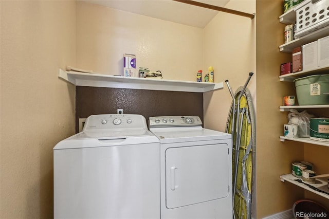 11565 Decatur St Unit 7D, Denver, CO 80234 - laundry room featuring washing machine and dryer