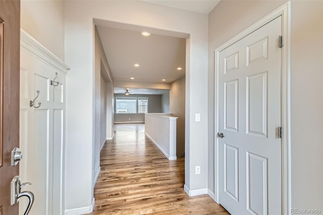 hall with light hardwood / wood-style flooring