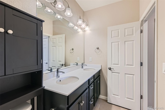 bathroom with vanity and tile patterned floors