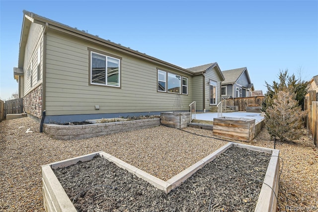 rear view of property with a deck