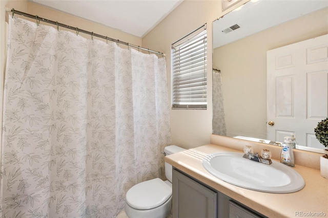 15627 E 51st Dr, Denver, CO 80239 - bathroom with toilet, visible vents, and vanity