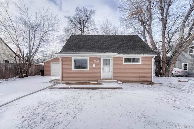 bungalow-style house featuring a garage