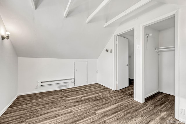 bonus room with lofted ceiling, baseboard heating, and dark hardwood / wood-style floors